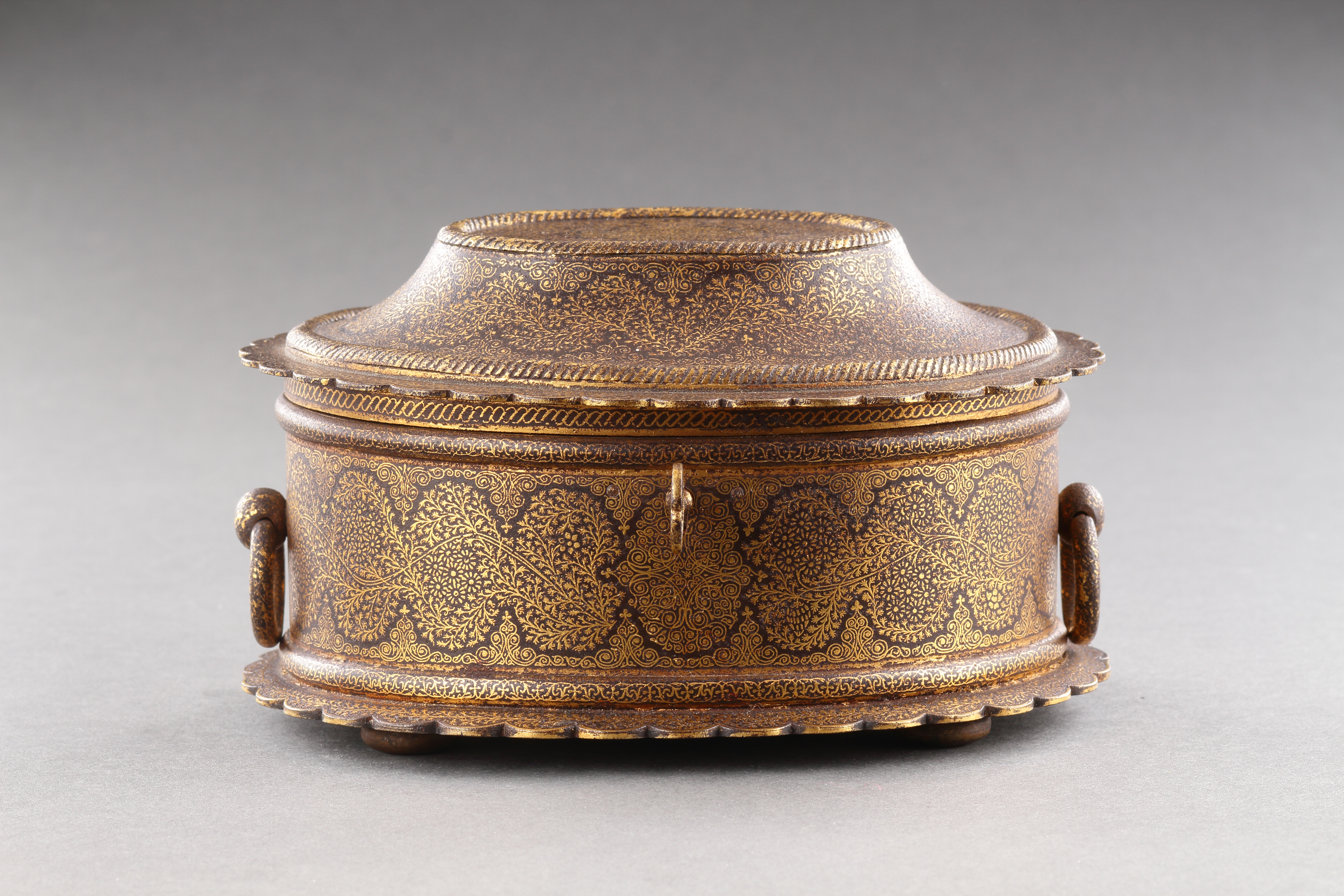 Indian Rajasthan Iron Casket Decorated with Gold Damascene with Foliate and Tendril Designs in the Koftgari Technique of Oval Form 